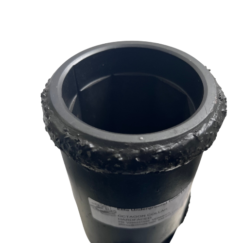 A close up of the bottom of a black cup