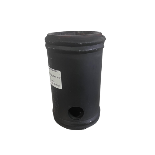 A black container with a hole in the bottom.