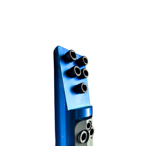 A blue remote control with six black knobs.