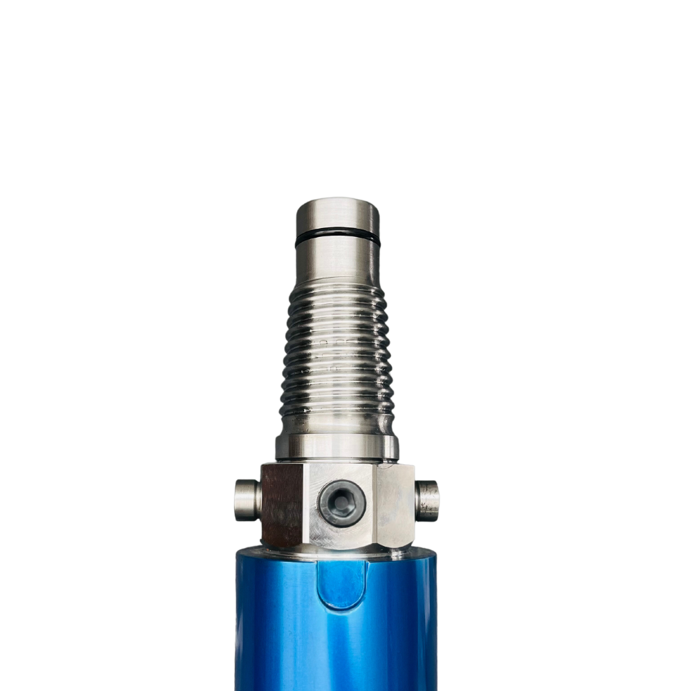 A close up of the tip of a blue pen