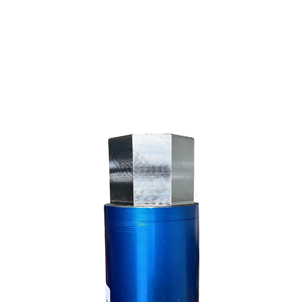 A blue tube with a metal cube on top of it.