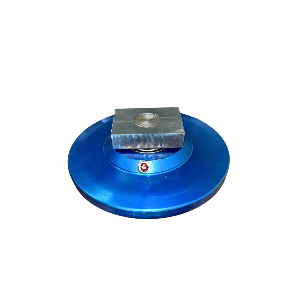 A blue disc with a metal square on top.