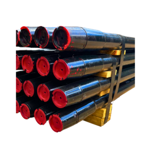 A stack of pipes with red caps.