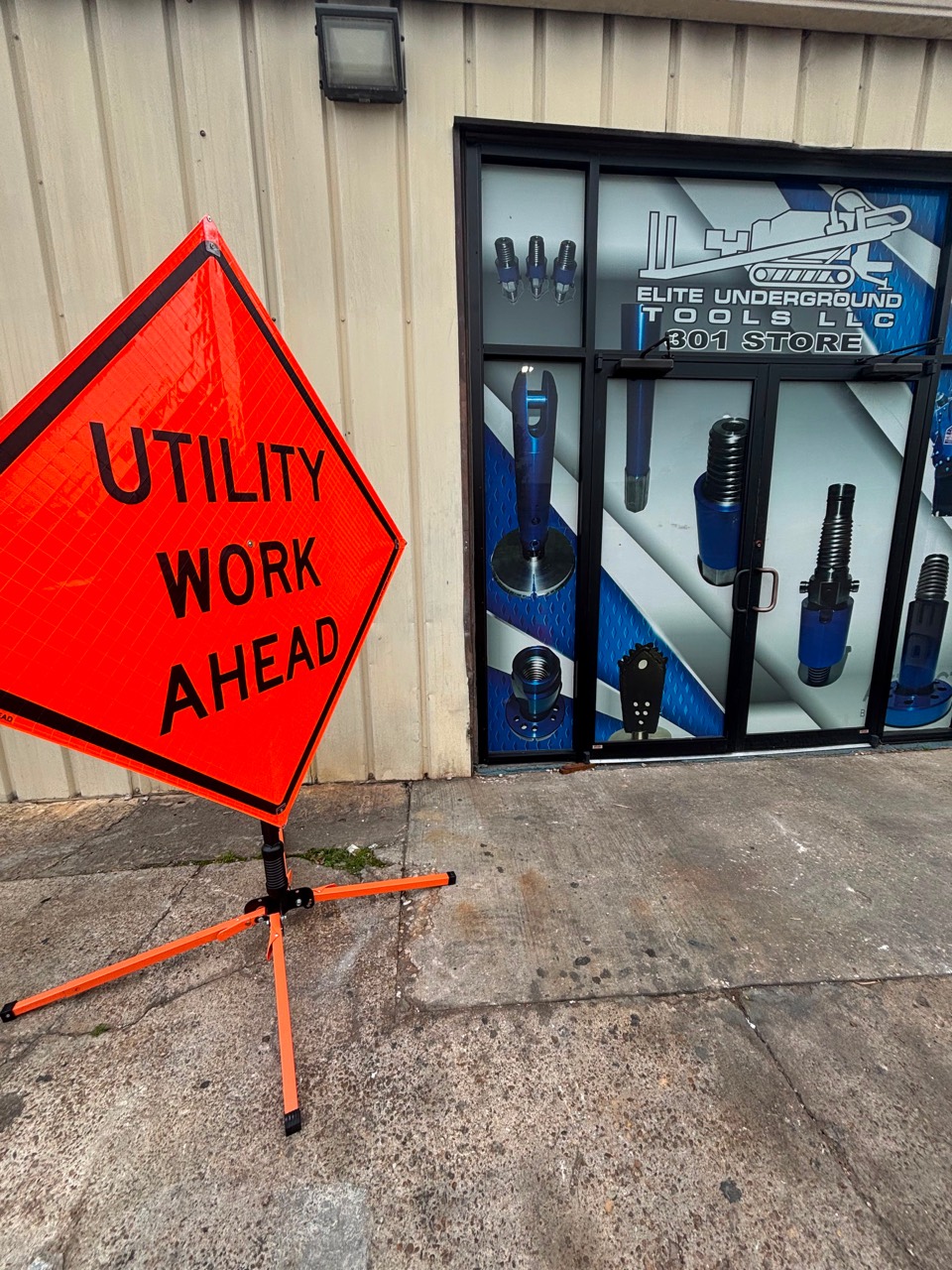Utility Work Ahead roll-up warning sign with portable stand
