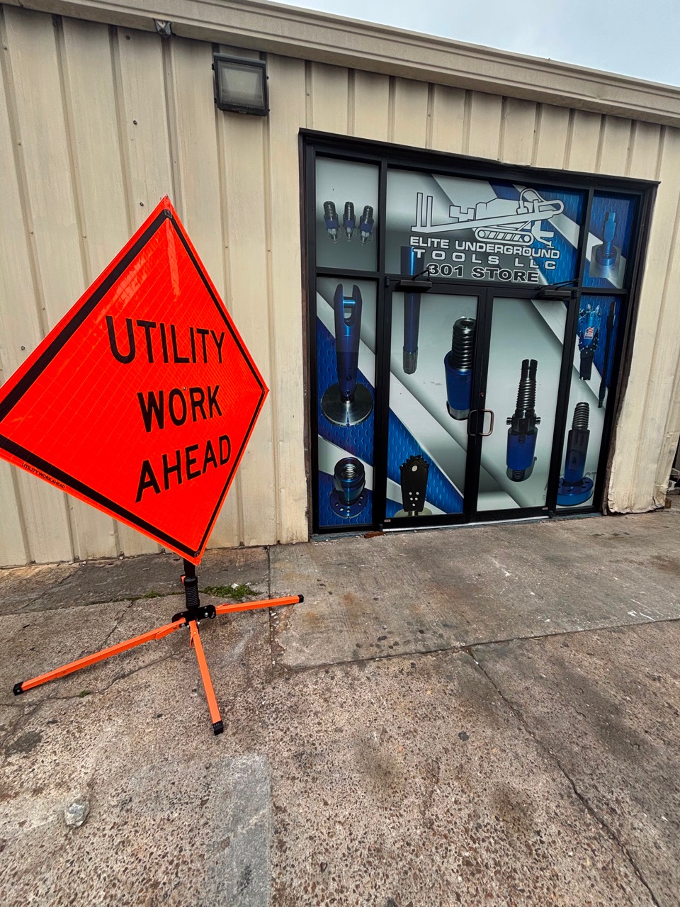 Utility Work Ahead roll-up warning sign with portable stand
